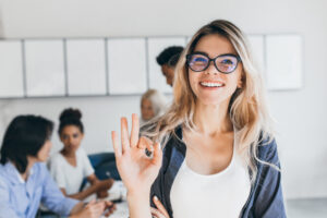 close up portrait pretty female manager from sales department indoor photo smiling woman working office with discussing people close up portrait pretty female manager from sales department indoor photo smiling woman working office with discussing people
