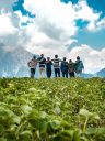 Young friends on top of a mountain enjoying the mesmerizing view